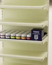PRJ.06 — photoreal retail shelf render with branded jars and a display box